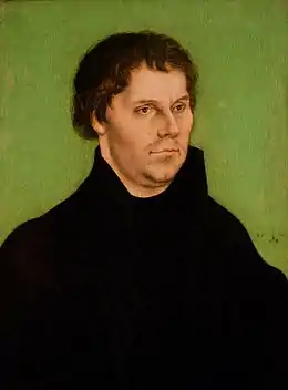 Portrait of the Protestant Reformer Martin Luther, dressed in black, with green background