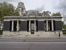 A rectangular monument in the shape of a vaulted colonnade
