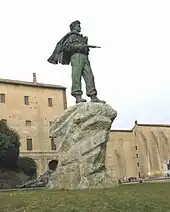 The Monumento al Partigiano in Parma (Italy) depicts a Resistance fighter in battledress, wielding a Sten Gun.