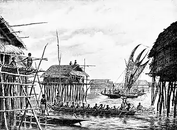 Image 20Papuan lake dwellings with a lakatoi under sail, 1898 or before (from History of Papua New Guinea)