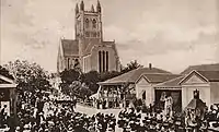 A church parade by the Royal Navy and British Army in front of the incomplete cathedral, circa 1900