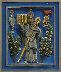 Kentigern with a robin, a bell and a fish with a ring in its mouth