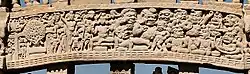 Buddha during the battle with Mara pointing towards the earth, summoning Phra Mae Thorani to come to his assistance from Sanchi. She is on the left hand and holding Kalasha.