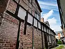 Timber in side elevations of houses in Wem gentrified in the Georgian Period.